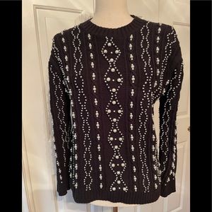 Pearl and black sweater